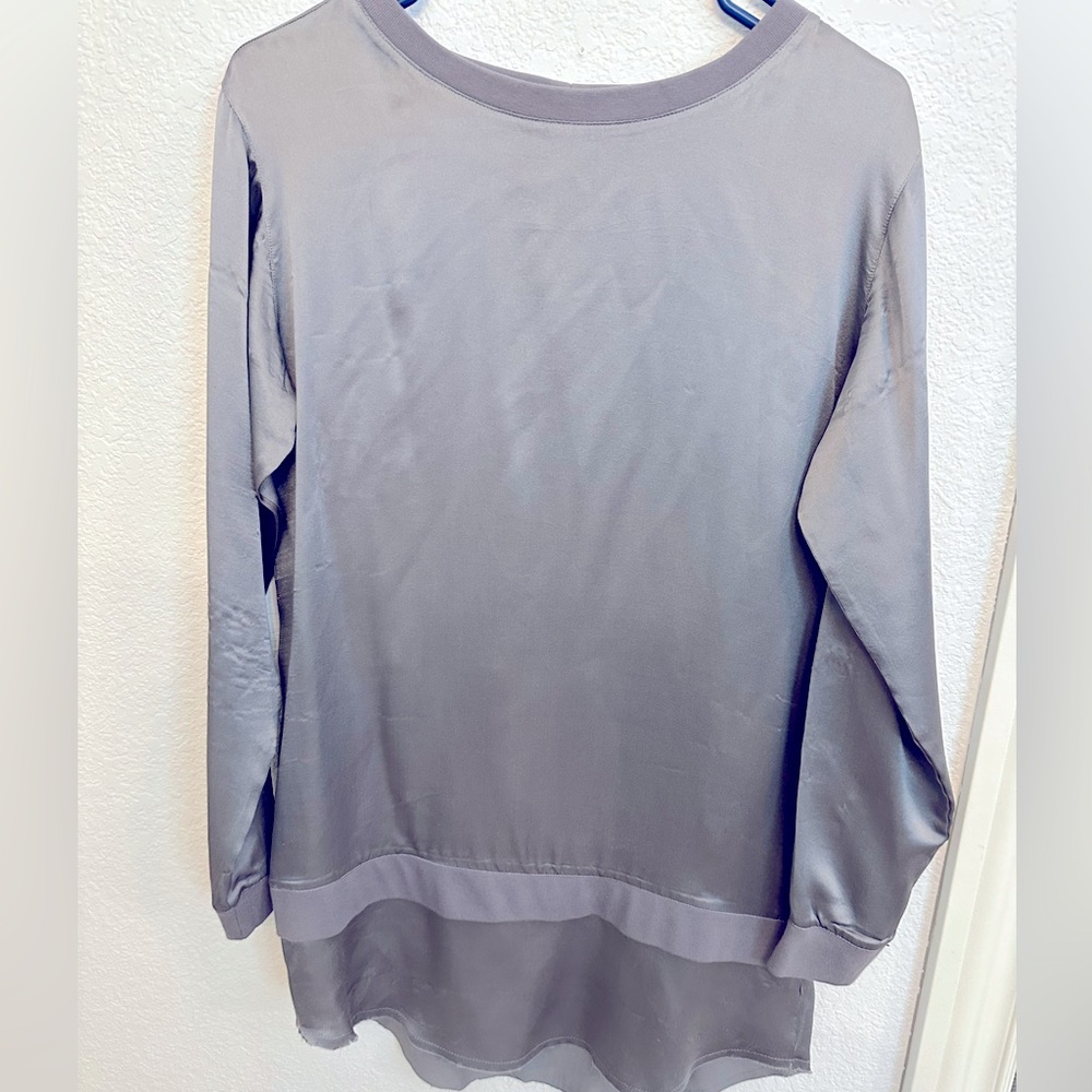 Silk blouse with cotton trim.  Brand is R+A. Size is xs, fits like medium.